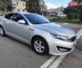 Серый Киа K5, объемом двигателя 2 л и пробегом 164 тыс. км за 7500 $, фото 1 на Automoto.ua