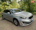 Серый Киа K5, объемом двигателя 2 л и пробегом 300 тыс. км за 7300 $, фото 3 на Automoto.ua