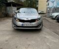 Серый Киа K5, объемом двигателя 2 л и пробегом 235 тыс. км за 8500 $, фото 1 на Automoto.ua
