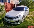 Серый Киа K5, объемом двигателя 2 л и пробегом 248 тыс. км за 7500 $, фото 1 на Automoto.ua
