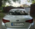 Серый Киа K5, объемом двигателя 2 л и пробегом 300 тыс. км за 7300 $, фото 2 на Automoto.ua