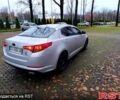 Серый Киа K5, объемом двигателя 2 л и пробегом 405 тыс. км за 7500 $, фото 4 на Automoto.ua