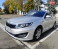 Серый Киа K5, объемом двигателя 2 л и пробегом 164 тыс. км за 7500 $, фото 5 на Automoto.ua
