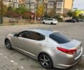 Серый Киа K5, объемом двигателя 2 л и пробегом 340 тыс. км за 8500 $, фото 1 на Automoto.ua