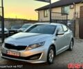 Серый Киа K5, объемом двигателя 2 л и пробегом 284 тыс. км за 6999 $, фото 1 на Automoto.ua