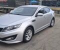 Серый Киа K5, объемом двигателя 2 л и пробегом 316 тыс. км за 7700 $, фото 1 на Automoto.ua