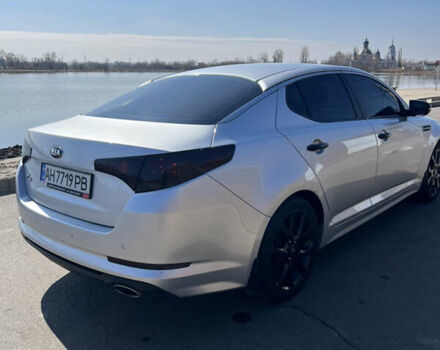 Серый Киа K5, объемом двигателя 2 л и пробегом 248 тыс. км за 9500 $, фото 12 на Automoto.ua
