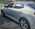 Серый Киа K5, объемом двигателя 2 л и пробегом 246 тыс. км за 7000 $, фото 1 на Automoto.ua