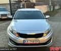 Серый Киа K5, объемом двигателя 2 л и пробегом 284 тыс. км за 6999 $, фото 1 на Automoto.ua