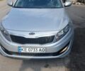Серый Киа K5, объемом двигателя 2 л и пробегом 246 тыс. км за 7000 $, фото 4 на Automoto.ua