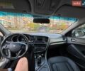 Серый Киа K5, объемом двигателя 2 л и пробегом 340 тыс. км за 8500 $, фото 14 на Automoto.ua
