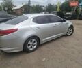 Серый Киа K5, объемом двигателя 2 л и пробегом 350 тыс. км за 7750 $, фото 2 на Automoto.ua