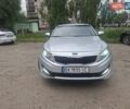 Серый Киа K5, объемом двигателя 2 л и пробегом 350 тыс. км за 7750 $, фото 1 на Automoto.ua