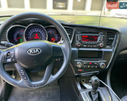 Серый Киа K5, объемом двигателя 2 л и пробегом 230 тыс. км за 6500 $, фото 11 на Automoto.ua