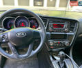 Серый Киа K5, объемом двигателя 2 л и пробегом 230 тыс. км за 6500 $, фото 11 на Automoto.ua