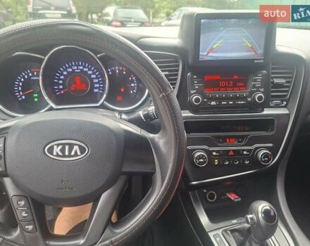 Серый Киа K5, объемом двигателя 2 л и пробегом 350 тыс. км за 7750 $, фото 5 на Automoto.ua