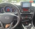 Серый Киа K5, объемом двигателя 2 л и пробегом 350 тыс. км за 7750 $, фото 5 на Automoto.ua