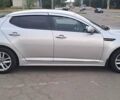 Серый Киа K5, объемом двигателя 2 л и пробегом 316 тыс. км за 7700 $, фото 7 на Automoto.ua