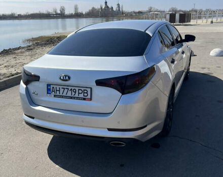 Серый Киа K5, объемом двигателя 2 л и пробегом 248 тыс. км за 9500 $, фото 11 на Automoto.ua