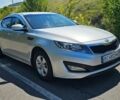 Серый Киа K5, объемом двигателя 2 л и пробегом 263 тыс. км за 7500 $, фото 1 на Automoto.ua