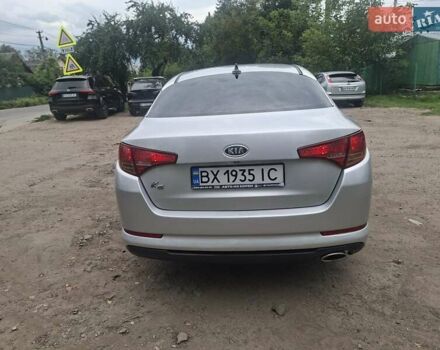Серый Киа K5, объемом двигателя 2 л и пробегом 350 тыс. км за 7750 $, фото 4 на Automoto.ua