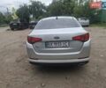 Серый Киа K5, объемом двигателя 2 л и пробегом 350 тыс. км за 7750 $, фото 4 на Automoto.ua