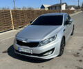 Серый Киа K5, объемом двигателя 2 л и пробегом 248 тыс. км за 9500 $, фото 5 на Automoto.ua