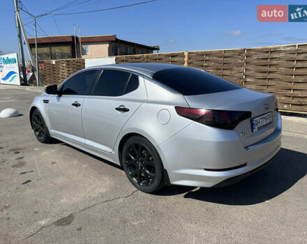 Серый Киа K5, объемом двигателя 2 л и пробегом 248 тыс. км за 9500 $, фото 15 на Automoto.ua