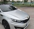 Серый Киа K5, объемом двигателя 2 л и пробегом 325 тыс. км за 9300 $, фото 4 на Automoto.ua