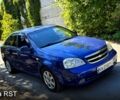 Серый Киа K5, объемом двигателя 2 л и пробегом 200 тыс. км за 8500 $, фото 1 на Automoto.ua