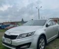 Серый Киа K5, объемом двигателя 2 л и пробегом 200 тыс. км за 8500 $, фото 1 на Automoto.ua