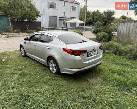 Серый Киа K5, объемом двигателя 2 л и пробегом 280 тыс. км за 7500 $, фото 7 на Automoto.ua