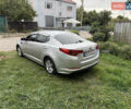 Серый Киа K5, объемом двигателя 2 л и пробегом 280 тыс. км за 7500 $, фото 7 на Automoto.ua