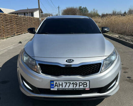 Серый Киа K5, объемом двигателя 2 л и пробегом 248 тыс. км за 9500 $, фото 4 на Automoto.ua