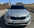 Серый Киа K5, объемом двигателя 2 л и пробегом 248 тыс. км за 9500 $, фото 4 на Automoto.ua