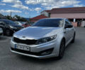 Серый Киа K5, объемом двигателя 2 л и пробегом 185 тыс. км за 7300 $, фото 2 на Automoto.ua