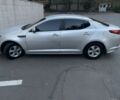 Серый Киа K5, объемом двигателя 2 л и пробегом 285 тыс. км за 6900 $, фото 1 на Automoto.ua