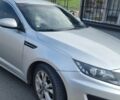 Серый Киа K5, объемом двигателя 2 л и пробегом 246 тыс. км за 7000 $, фото 3 на Automoto.ua