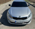 Серый Киа K5, объемом двигателя 2 л и пробегом 248 тыс. км за 9500 $, фото 3 на Automoto.ua