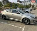 Серый Киа K5, объемом двигателя 2 л и пробегом 340 тыс. км за 8500 $, фото 4 на Automoto.ua