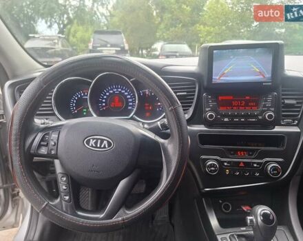 Серый Киа K5, объемом двигателя 2 л и пробегом 350 тыс. км за 7750 $, фото 6 на Automoto.ua