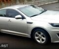 Серый Киа K5, объемом двигателя 2 л и пробегом 170 тыс. км за 10000 $, фото 3 на Automoto.ua