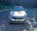Серый Киа K5, объемом двигателя 2 л и пробегом 382 тыс. км за 9000 $, фото 1 на Automoto.ua