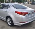 Серый Киа K5, объемом двигателя 2 л и пробегом 316 тыс. км за 7700 $, фото 4 на Automoto.ua