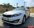 Серый Киа K5, объемом двигателя 2 л и пробегом 190 тыс. км за 9500 $, фото 1 на Automoto.ua