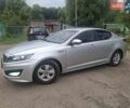 Серый Киа K5, объемом двигателя 2 л и пробегом 350 тыс. км за 7750 $, фото 1 на Automoto.ua