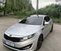 Серый Киа K5, объемом двигателя 2 л и пробегом 325 тыс. км за 9300 $, фото 1 на Automoto.ua