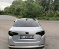 Серый Киа K5, объемом двигателя 2 л и пробегом 325 тыс. км за 9300 $, фото 1 на Automoto.ua
