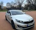 Серый Киа K5, объемом двигателя 2 л и пробегом 174 тыс. км за 8000 $, фото 1 на Automoto.ua