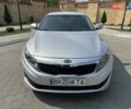 Серый Киа K5, объемом двигателя 2 л и пробегом 190 тыс. км за 9500 $, фото 1 на Automoto.ua